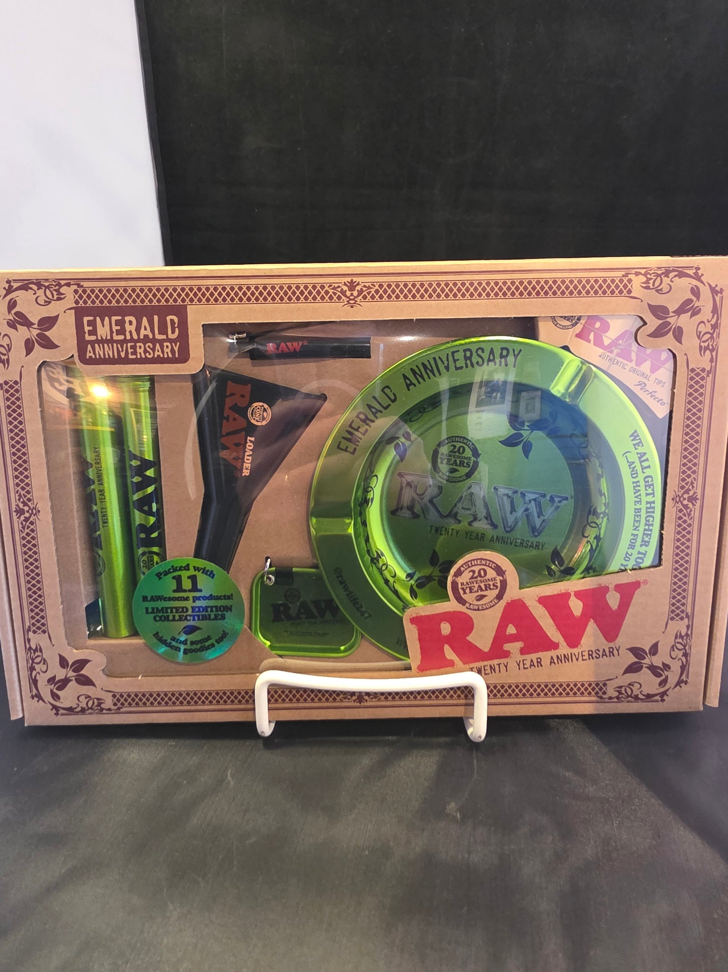 RAW smoking accessory set with green components on a patterned card